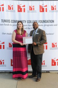Nicole Davey (left) of Bristol was one of three recipients who received scholarships from Liberty Bank during the event. She stands with Clarence Bowen (right), Bristol Branch Manager for Liberty Bank, which has donated $15,000 in scholarships to Tunxis Foundation since 2014. 