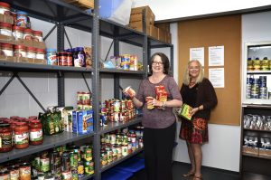 L to R: Tunxis food pantry committee members Helen Lozada, Financial Aid Services acting associate director, and Maggie Carlin, student services specialist, are among staff and student volunteers who helped establish thePantry@Tunxis. 